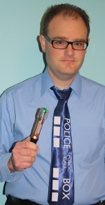 Cory Milles with his TARDIS tie and sonic screwdriver.